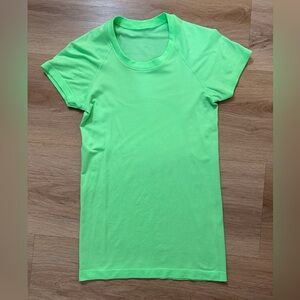 Lululemon Swiftly Tech Waist length short sleeve shirt in *Pistachio*
